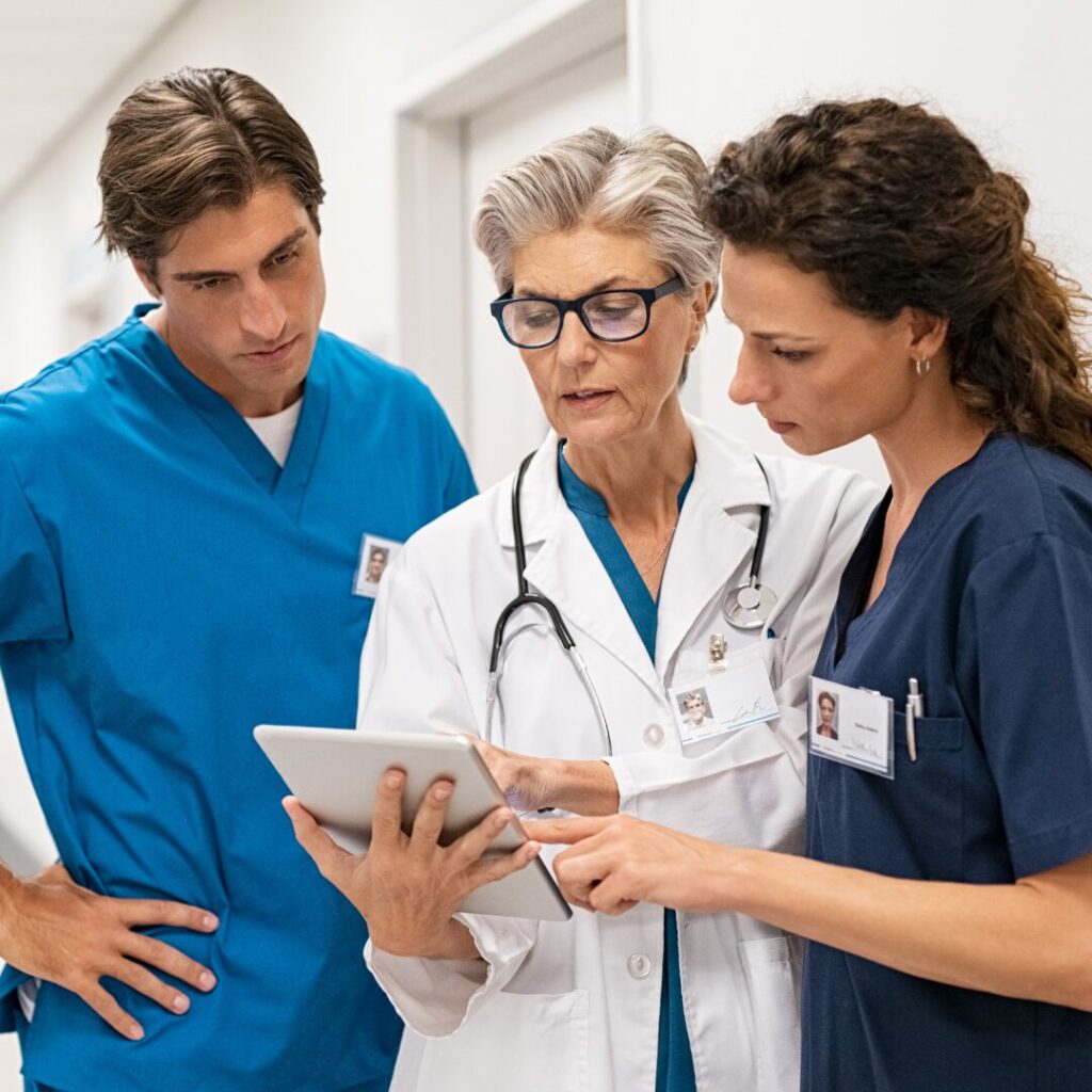 Doctors conversing and working at a hospital