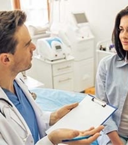doctor talking to patient