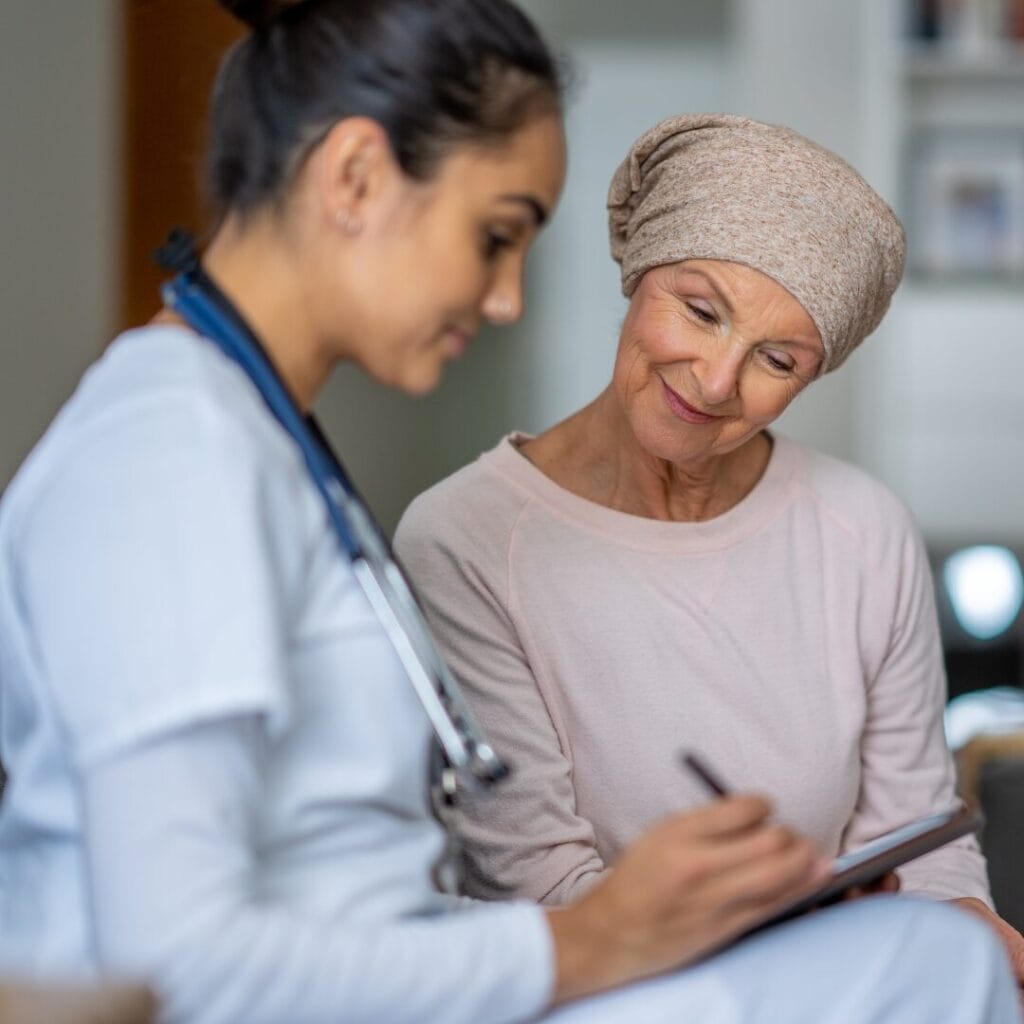 an oncologist talking to a cancer patient